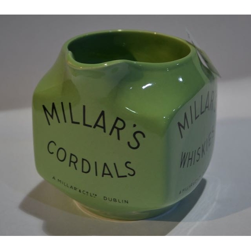 434 - Arklow Pottery Millars Whiskies, Wines ,Cordials Jug. A Millar & Co Ltd Dublin