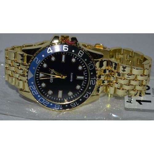 1131 - Gold Coloured Geneva Watch With Blue Bezel