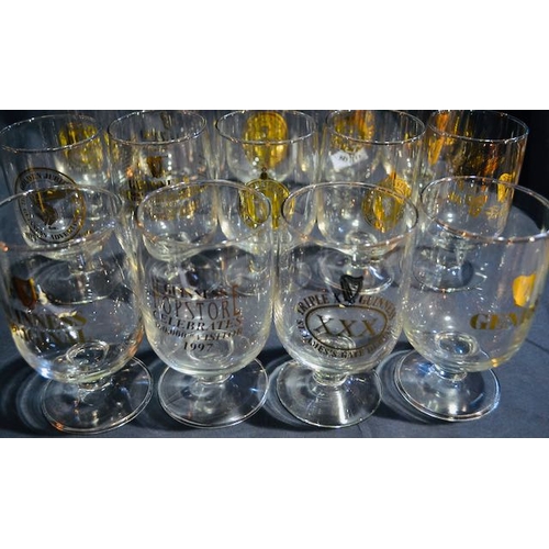 66 - Collection of 14 Gilted Guinness Goblet