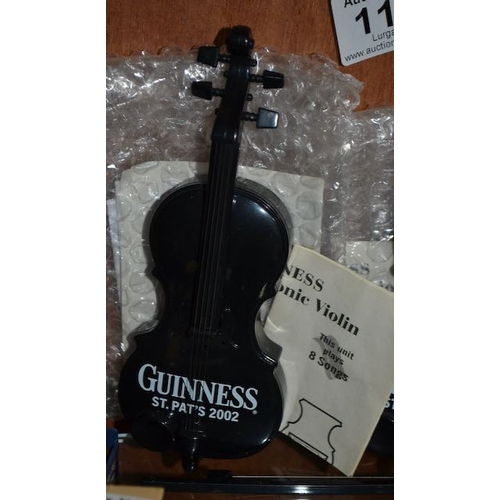 113 - Mini Guinness Electronic Violin - Plays 8 Songs x2