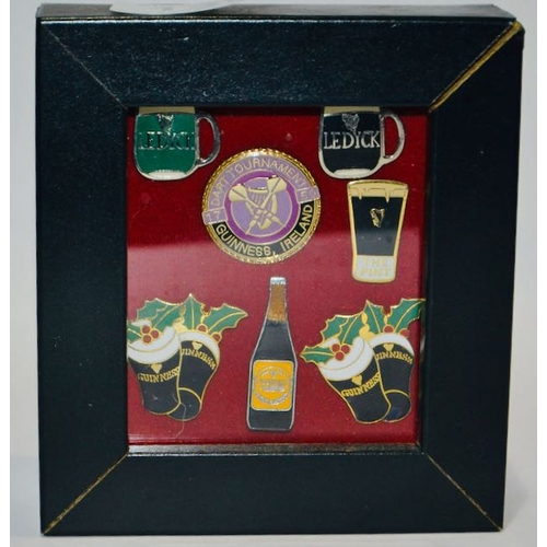 130 - Mounted Guinness Badge Collection in Frame Incl Guinness Ireland Dart Tournament, 2x Guinness Tankar... 