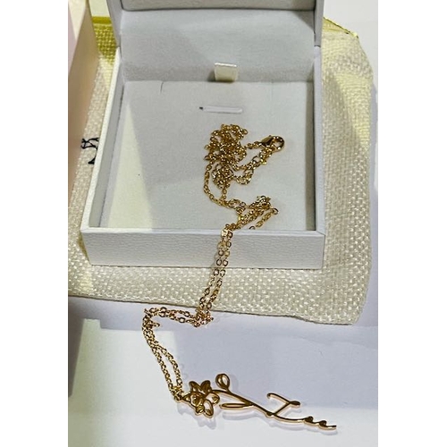 1050 - Floral Zoe Pendant Necklace Plus L Letter Necklace.