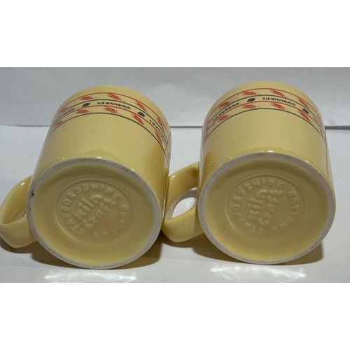 74 - Pair Of Staffordshire Kiln Craft Guinness Mugs