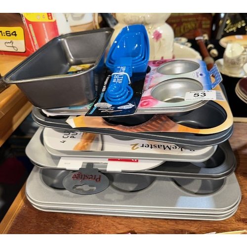 53 - Large Lot Of Unused Bun Trays Etc