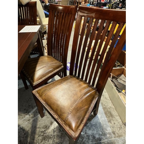 199 - Quality dining table with six slat back leather seated chairs