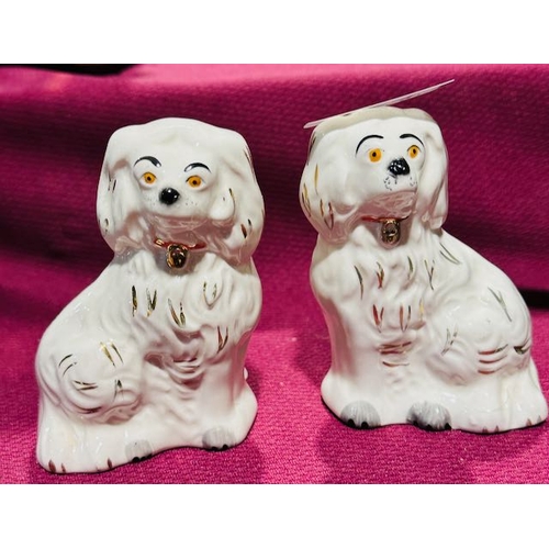 124 - Pair of Miniature Bewsick Hearth Dogs