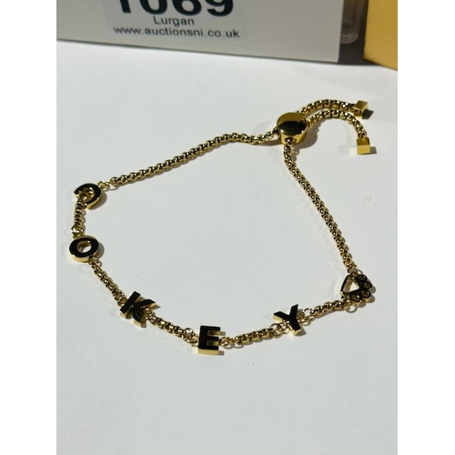 1069 - Abbott Lyon Bangle Name Bracelet Cokey