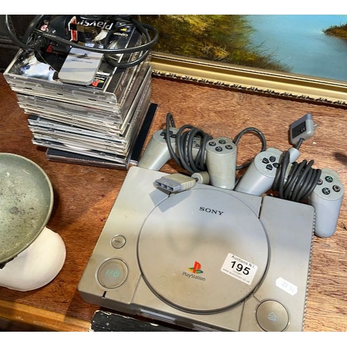 195 - Sony Playstation with Controllers/Games