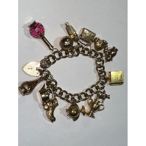 344 - 9ct Heart Clasp Charm Bracelet with 12 Hallmarked Gold Charms