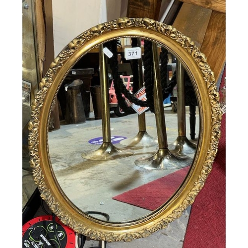 371 - Ornate Oval Gilt Mirror