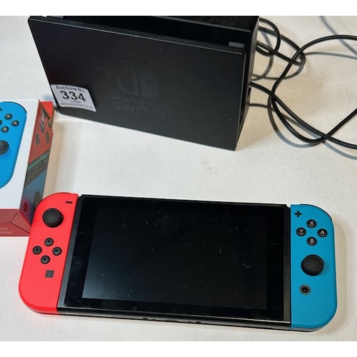 334 - Nintendo Switch with Charger + Extra Pair of Joy-Con