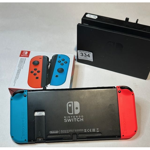 334 - Nintendo Switch with Charger + Extra Pair of Joy-Con