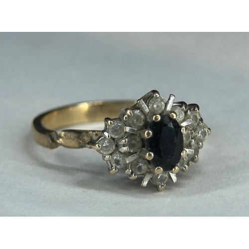 376 - 9ct Sapphire Cluster Ring (Band Split)