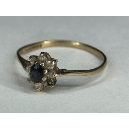 378 - 9ct Sapphire Cluster Ring (1 Stone Missing)