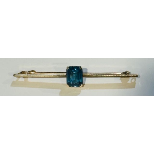 292 - 9ct Bar Brooch with Sapphire