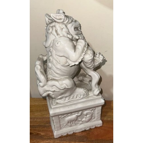 342 - 2x Antique Chinese Porcelain 'Blanc De Chine' Foo Dogs