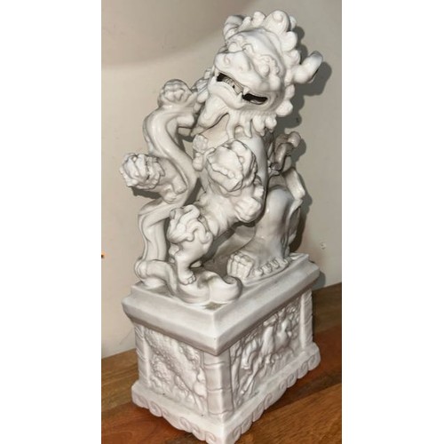 342 - 2x Antique Chinese Porcelain 'Blanc De Chine' Foo Dogs