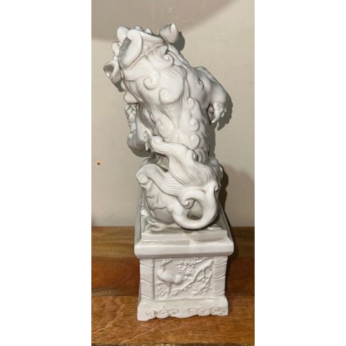 342 - 2x Antique Chinese Porcelain 'Blanc De Chine' Foo Dogs