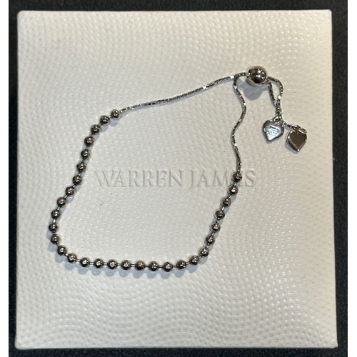 1010 - Warren James Silver Adjustable Heart Pendant Bracelet