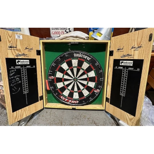 35 - Unicorn Dart Board In Wooden Wall Case