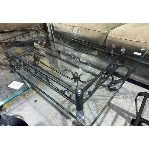 271 - Glass Topped Coffee Table On Ornate Metal Base