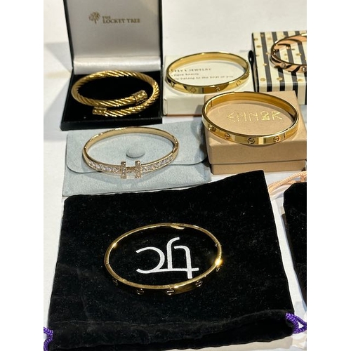 1064 - Collection Of Gold Tone Bangles