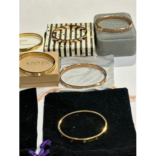 1064 - Collection Of Gold Tone Bangles