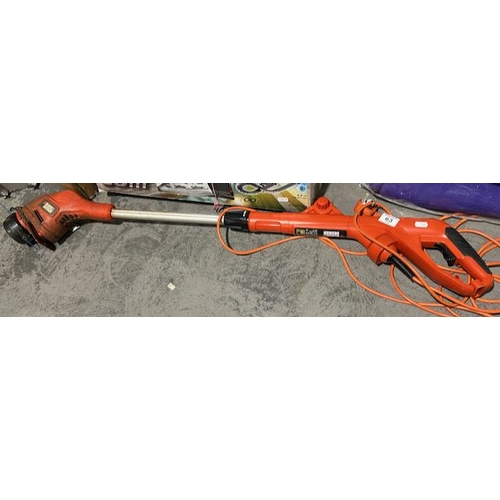 63 - Black & Decker Electric Strimmer working