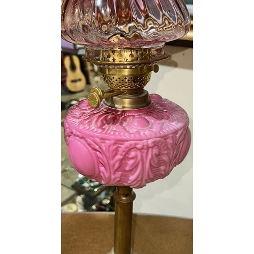 208 - Antique Brass Based Oil Lamp with Ornate Pink Glass Reservoir & Cranberry Fluted Shade