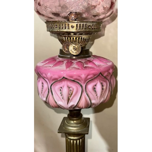 215 - Antique Brass Corinthian Column Based Oil Lamp with Pink Handpainted Glass Reservoir & Dimpled Cranb... 