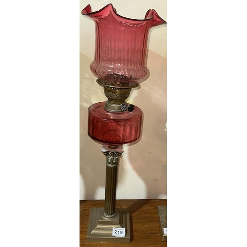 219 - Antique Brass Column Based Oil Lamp with Cranberry Glass Reservoir, Young's Burner & Cranberry Glass... 