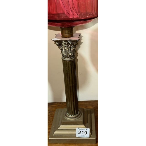 219 - Antique Brass Column Based Oil Lamp with Cranberry Glass Reservoir, Young's Burner & Cranberry Glass... 