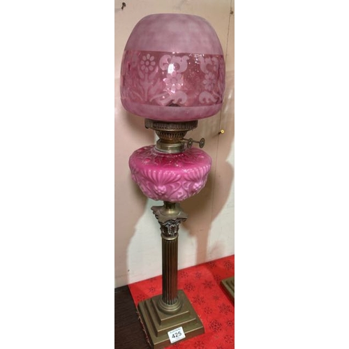 425 - Antique Brass Corinthian Based Oil Lamp with Ornate Pink Glass Reservoir & Cranberry Frosted Shade