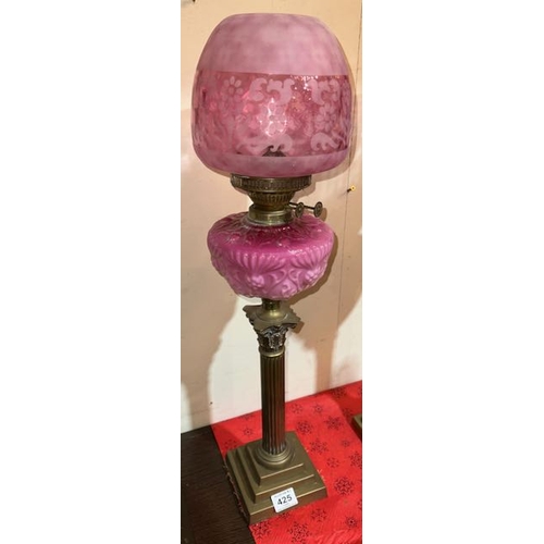 425 - Antique Brass Corinthian Based Oil Lamp with Ornate Pink Glass Reservoir & Cranberry Frosted Shade