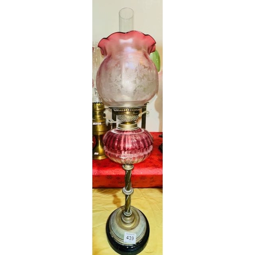 439 - Antique Brass Column Based Oil Lamp with Cranberry Glass Reservoir & Cranberry Frosted Glass Fluted ... 