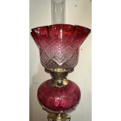 562 - Antique Brass Corinthian Column Oil Lamp with Ruby Glass Reservoir & Ruby Dimpled Fluted Shade