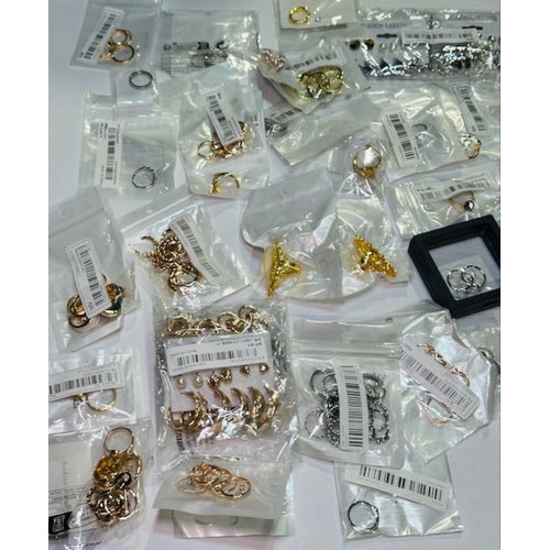 932 - Large Collection of Dress Rings Etc