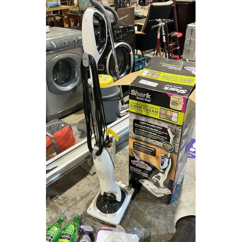 19 - Shark Sonic Duo Floor Cleaner In Original Box + Quantity of Cleaning Solutions/ Pads Etc