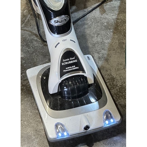 19 - Shark Sonic Duo Floor Cleaner In Original Box + Quantity of Cleaning Solutions/ Pads Etc