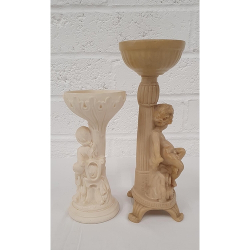 359 - Pair of Carved Resin Figural Candle Bowls featuring Cherubs seated under the bowl, tallest 12