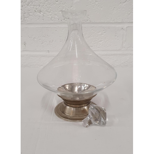 340 - Fine blown glass spinning top decanter on plated base