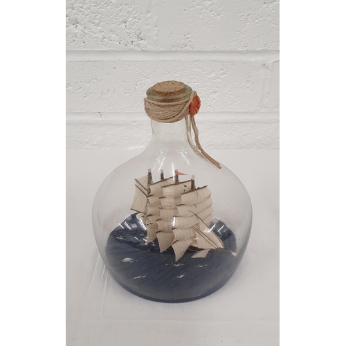 364 - Tall mast sailing ship in a bottle