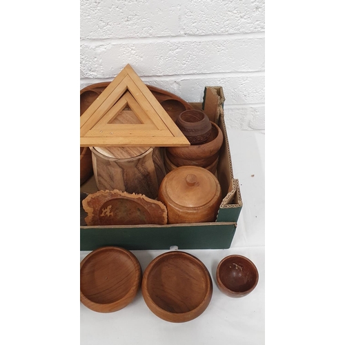 154 - Collection of wooden treen items including Bowls, trivets and pots