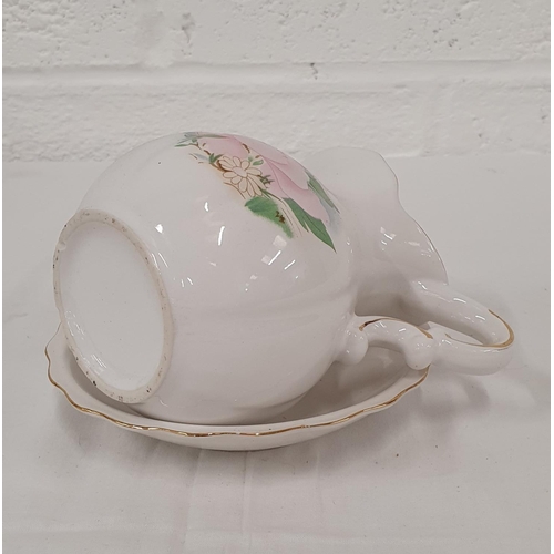 317 - Miniature jug & bowl set with pink floral design