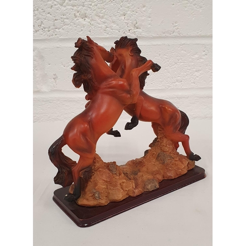 371 - Large resin figure of a pair of fighting stallions