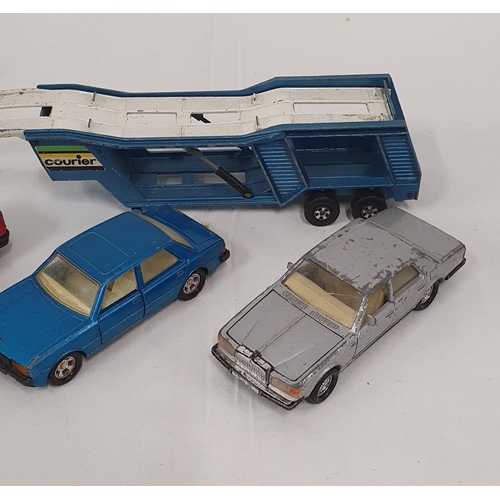 269 - 4 Playworn diecast vehicles including car trailer