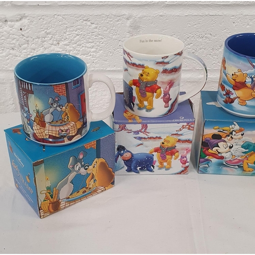 320 - Group of 4 boxed collectible Disney cups