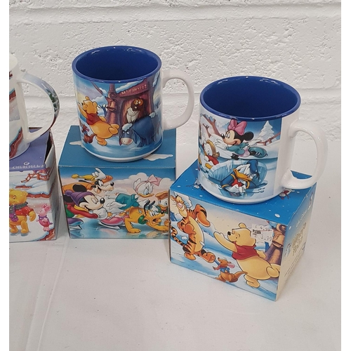 320 - Group of 4 boxed collectible Disney cups