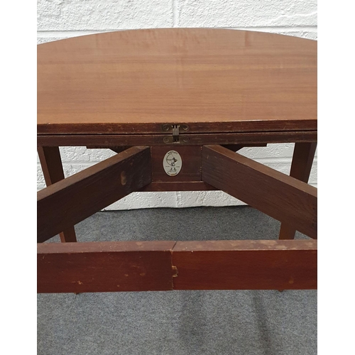 516 - Good quality vintage Bartlett of High Wycombe  metamorphic circular table, 40