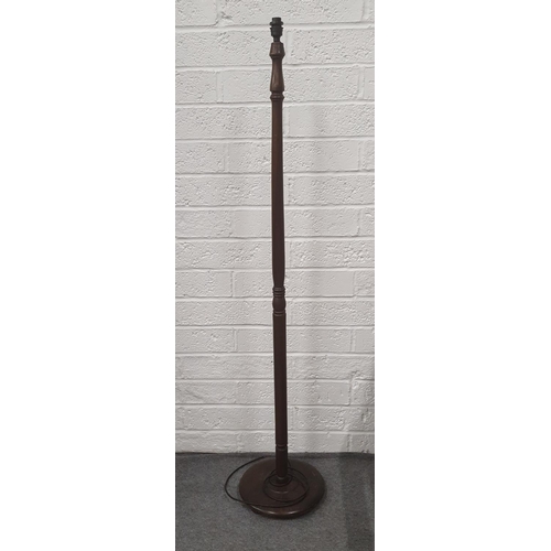 124 - Tall dark wood standard lamp, 62